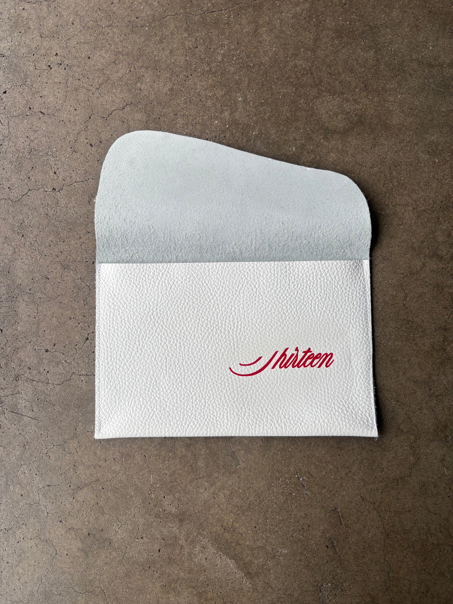 THIRTEENTHIRTEEN WHITE LEATHER CLUTCH